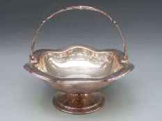 A possibly Italian white metal swing handled basket marked with a star then 30 PD and 800,