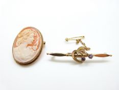 A 9ct gold cameo brooch and a 9ct gold Victorian brooch set with amethysts