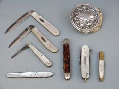 Four hallmarked silver fruit knives with mother of pearl handles,