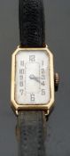J W Benson 18ct gold ladies wristwatch with black hand and Arabic numerals, silver face,