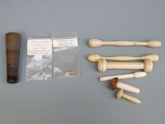 Six 19th/early 20thC turned ivory miniature darning tools and similar agate glove darning tool,