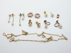 A quantity of 9ct and yellow metal earrings set with pearls and a yellow metal necklace marked 18ct
