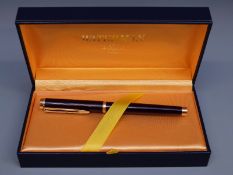 Waterman Ideal fountain pen with maroon barrel and cap, gold plated fittings and 18ct gold nib, 14.