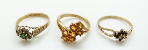 Two 9ct gold rings one set with garnets and a 9ct gold ring set with citrines, size N, Q and P/Q, 6.