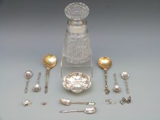 A white metal lobed dish marked 800 diameter 9.