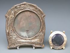 An Edwardian VII embossed hallmarked silver picture frame with a nightingale and crescent moon,
