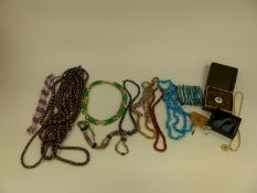 A quantity of costume jewellery including beaded amethyst necklace, sunstone necklace,