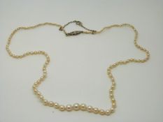 A single strand of natural & cultured pearls with diamond clasp with AnchorCert certificate