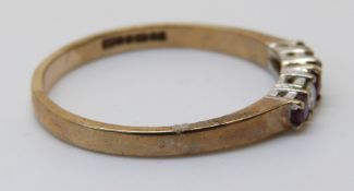 A 9ct gold ring set with rubies and diamonds, size S/T, 2.