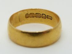 A 22ct gold wedding band, Birmingham 1902, 4.