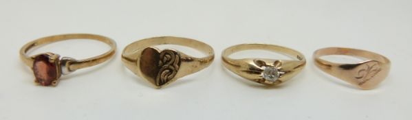 Four 9ct gold rings including diamond and garnet set, 3.