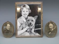 A George V hallmarked silver photograph frame with engine turned decoration to suit 8 x 6 inch