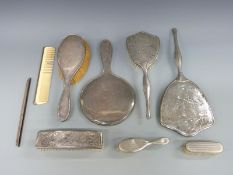 A hallmarked silver mounted hand mirror and similar brush,