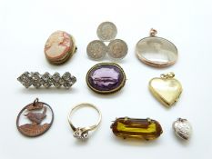 A 9ct gold ring set with two diamonds, Victorian brooches, locket,