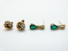 A pair of 9ct gold earrings in the form of a knot set with diamonds and a pair of 9ct gold earrings