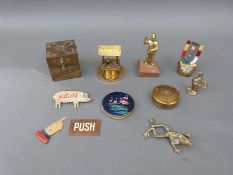 A flamingo enamelled Stratton powder compact, Hilliers advertising pig (local Nailsworth interest),