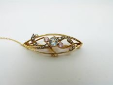 A 15ct gold Edwardian brooch set with an aquamarine,