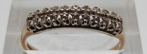 A 9ct gold ring set with diamonds, size P, 1.