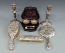 A pair of Edward VII hallmarked silver neoclassical style candlesticks, height 16.
