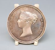 A white metal medal for the Stampex Trophy Contest Award, named to Dr R Casey 1969, diameter 5.