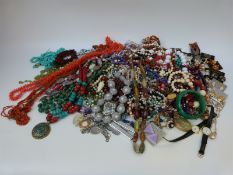 A large collection of costume jewellery including turquoise and coral