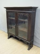 A late 19thC glazed display cabinet,