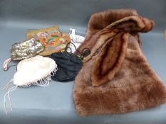 A fur stole and cravat