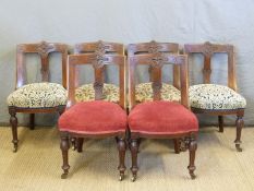 A set of six late Victorian carved back dining chairs with turned,