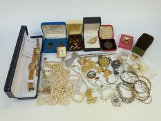 A collection of costume jewellery to include beads, boxed silver cufflinks,