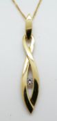A 9ct gold necklace set with a cubic zirconia, 3.