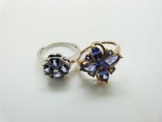 A 9ct white gold ring set with tanzanites and diamonds and a 9ct gold example set with tanzanites,