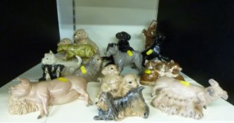 A large collection of Heredities ceramic animal figures including dogs, cats,