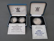 A 1990 Royal Mint UK silver proof crown for the Queen Mother's 90th birthday,