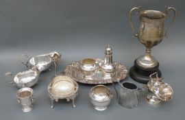 A quantity of various silver plated items to include cream jug, sauce boats, sugar basin and scoop,