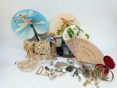 A collection of costume jewellery to include silver bracelet, silver thimble, earrings, faux pearls,