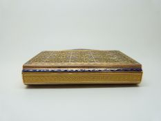 An early 19thC gold snuff box with blue enamel decoration,