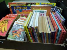A collection of Garfield books to include cartoon softbacks, annuals,