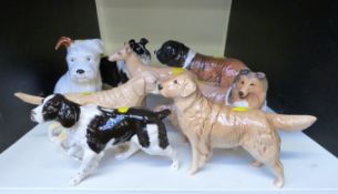 Beswick and Royal Doulton dog figures and an unmarked example (8)