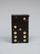 A novelty vesta case formed as a domino,