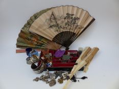 A collection of costume jewellery etc to include brooches, cufflinks, lighter,