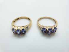 A 9ct gold ring set with topaz and another similar ring, size O and O, 5.