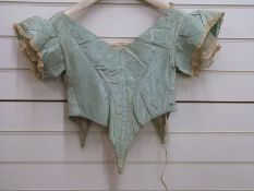 A Victorian silk taffeta boned fitted bodice or top with lace trim