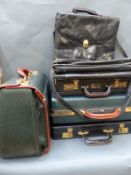A collection of briefcases and messenger bags,