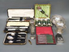 A quantity of cased silver plated cutlery including dessert sets and carving set,