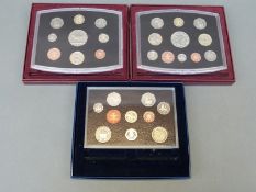 Three Royal Mint UK proof coin collections comprising 2002,