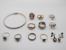 Nine silver rings, silver bangle,