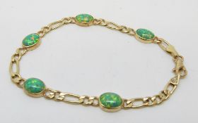A yellow metal bracelet set with synthetic opals, 6.
