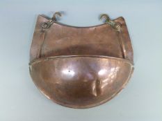 A 19thC Arts & Crafts copper drip tray or wall pocket with swing fastenings,