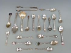 A quantity of hallmarked silver and white metal collector's spoons including three with import