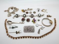 A collection of silver and other jewellery to include a silver charm bracelet with a quantity of